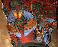 Oiseaux tenant une tête